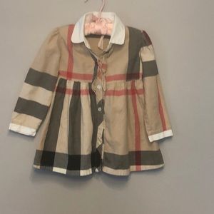 Burberry dress it says size M to me fits like a 2T. Smoke free pet free home.